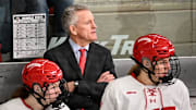Wisconsin Badgers head coach Mark Johnson and players watch the action in the second period of a WCHA first-round game against the Bemidji State Beavers on Saturday, March 1, 2025, at LaBahn Arena in Madison, Wisconsin.
