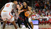Feb 20, 2025; College Park, Maryland, USA; USC Trojans guard Desmond Claude (1) handles the ball during the first half against Maryland Terrapins forward Julian Reese (10) at Xfinity Center. Mandatory Credit: Reggie Hildred-Imagn Images