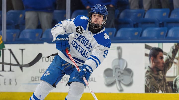 Detroit Catholic Central's Elian Szerlip flips a pass across the ice during a victory over Howell Saturday, March 8, 2025 at USA Hockey Arena. Detroit Catholic Central's Elian Szerlip flips a pass across the ice during a victory over Howell Saturday, March 8, 2025 at USA Hockey Arena.
