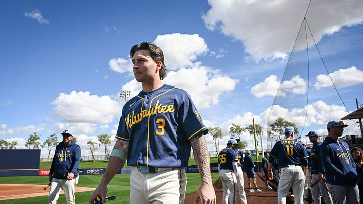 Milwaukee Brewers infield prospect Andrew Fischer walks across the field during spring training workouts Tuesday, February 17, 2026, at American Family Fields of Phoenix in Phoenix, Arizona.