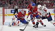 Apr 25, 2025; Montreal, Quebec, CAN; Montreal Canadiens goalie Sam Montembeault (35) stops Washington Capitals forward Nic Dowd (26) with the help of teammate defenseman Arber Xhekaj (72) during the first period in game three of the first round of the 2025 Stanley Cup Playoffs at the Bell Centre. Mandatory Credit: Eric Bolte-Imagn Images