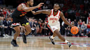 Ohio State Buckeyes guard Bruce Thornton (2) dribbles the ball past Maryland Terrapins forward Donta Scott (24) during the second half at Value City Arena.