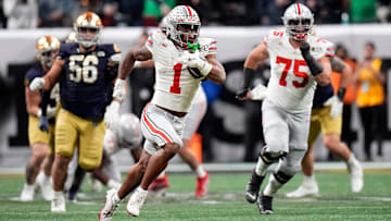 Ohio State Buckeyes running back Quinshon Judkins (1) gets away from the Notre Dame Fighting Irish defense for a long run in the third quarter during the College Football Playoff championship at Mercedes-Benz Stadium in Atlanta on January 20, 2025.
