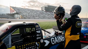 NASCAR Truck Series driver Kyle Busch suits up before the Rackley Roofing 200 at Nashville Superspeedway in Lebanon, Tenn., Friday, May 30, 2025.