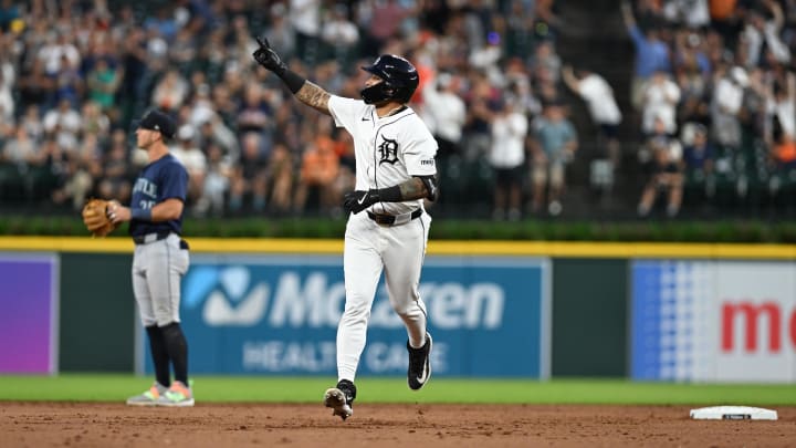 Aug 13, 2024; Detroit, Michigan, USA;  Detroit Tigers shortstop Javier Baez celebrates as he rounds the bases.