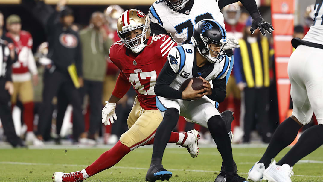 Nov 24, 2025; Santa Clara, California, USA; San Francisco 49ers defensive end Bryce Huff (47) puts pressure on Carolina Panthers quarterback Bryce Young (9) during the first half at Levi's Stadium. Mandatory Credit: Kelley L Cox-Imagn Images