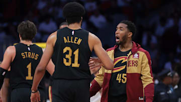 Cleveland Cavaliers guard Donovan Mitchell celebrates with center Jarrett Allen against the Miami Heat in the second quarter during game four for the first round of the 2025 NBA Playoffs.