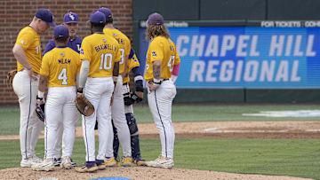 Jun 3, 2024; Chapel Hill, NC, USA;  The Louisiana State Tigers huddle on the mound during the second inning of the Div. I NCAA baseball regional against the North Carolina Tar Heels at Boshamer Stadium.  Mandatory Credit: Jeffrey Camarati-Imagn Images