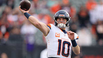 Dec 28, 2024; Cincinnati, Ohio, USA;  Denver Broncos quarterback Bo Nix (10) warms up before a game against the Cincinnati Bengals at Paycor Stadium. Mandatory Credit: Joseph Maiorana-Imagn Images