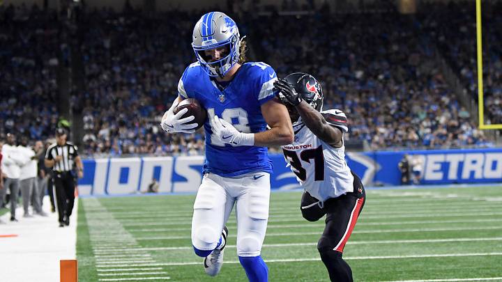 Aug 23, 2025; Detroit, Michigan, USA; Detroit Lions wide receiver Isaac TeSlaa (18) scores a touchdown against the Houston Texans in the first quarter at Ford Field. Mandatory Credit: Eamon Horwedel-Imagn Images