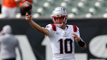 New England Patriots quarterback Drake Maye (10) warms up before the game against the Cincinnati Bengals at Paycor Stadium.