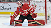 Feb 15, 2025; Montreal, Quebec, CAN; [Imagn Images direct customers only] Team Canada goalie Jordan Binnington (50) makes a save against Team United States in the first period during a 4 Nations Face-Off ice hockey game at the Bell Centre. Mandatory Credit: Eric Bolte-Imagn Images