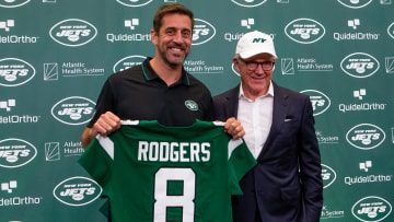 Aaron Rodgers and Woody Johnson