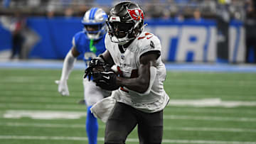 Chris Godwin runs with the football