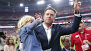 Carson Palmer waves to the crowd after his Arizona Cardinals Ring of Honor induction ceremony in 2019.