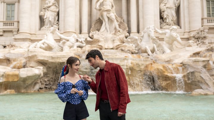 Emily in Paris. (L to R) Lily Collins as Emily, Eugenio Franceschini as Marcello in episode 409 of Emily in Paris. Cr. Giulia Parmigiani/Netflix © 2024