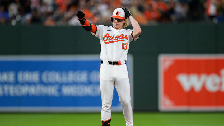 Jun 30, 2024; Baltimore, Maryland, USA; Baltimore Orioles outfielder Heston Kjerstad (13) reacts after hitting a double during the fourth inning against the Texas Rangers at Oriole Park at Camden Yards. 