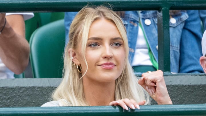 American influencer Morgan Riddle watches the Wimbledon tennis championships.