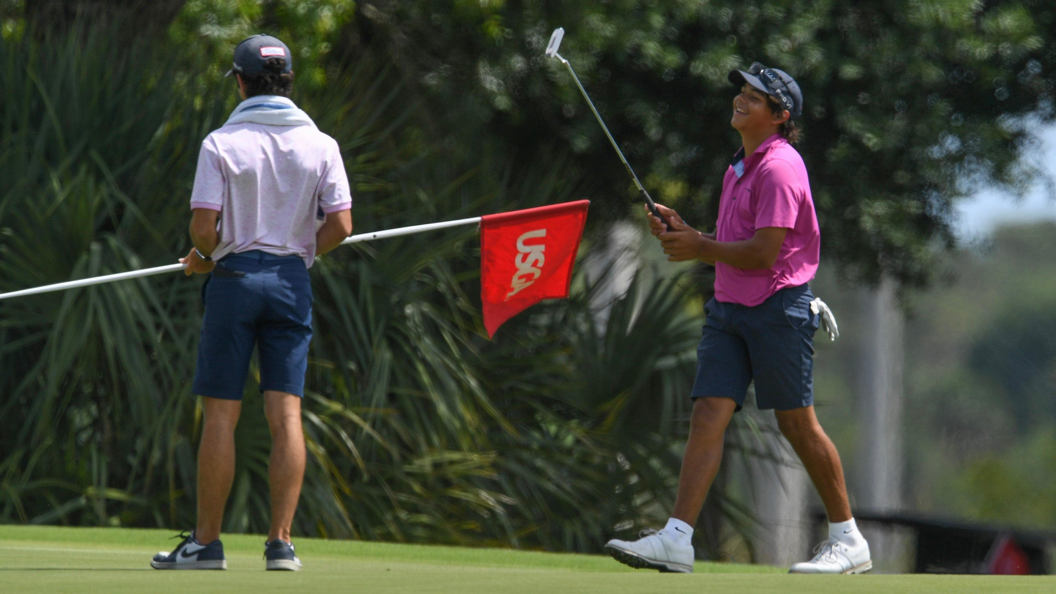 Charlie Woods reacts to missing a putt by inches during a 2024 U.S. Open qualifier.