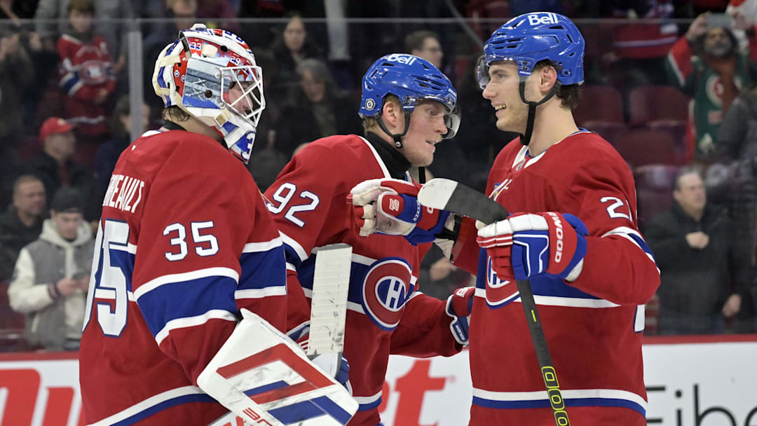 Dec 21, 2024; Montreal, Quebec, CAN; Montreal Canadiens goalie Sam Montembeault (35) celebrates with forward Patrik Laine (92) and forward Juraj Slafkovsky (20) after defeating the Detroit Red Wings at the Bell Centre. Mandatory Credit: Eric Bolte-Imagn Images
