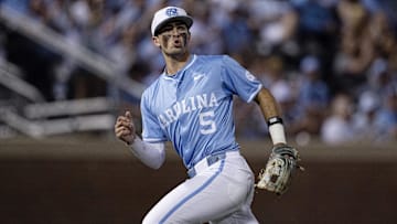 Jun 8, 2024; Chapel Hill, NC, USA; North Carolina Tar Heels Gavin Gallaher (5) reacts to making an out against the West Virginia Mountaineers in the fifth inning of the DI Baseball Super Regional at Boshamer Stadium. Mandatory Credit: Jeffrey Camarati-Imagn Images

