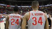 Ohio State Buckeye senior forward Andre Wesson (24) hangs out next to his brother Ohio State Buckeyes forward Kaleb Wesson (34) as he waits to be honored after the game against Illinois Fighting Illini at Value City Arena in Columbus, Ohio on March 5, 2020.