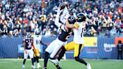 Nov 23, 2025; Chicago, Illinois, USA; Chicago Bears cornerback Nahshon Wright (26) breaks up a pass against Pittsburgh Steelers wide receiver Roman Wilson (10) during the second half at Soldier Field. Mandatory Credit: Mike Dinovo-Imagn Images