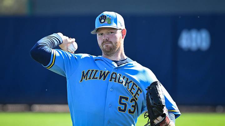 Milwaukee Brewers pitcher Brandon Woodruff (53) throws in the outfield during spring training workouts Saturday, February 14, 2026, at American Family Fields of Phoenix in Phoenix, Arizona.