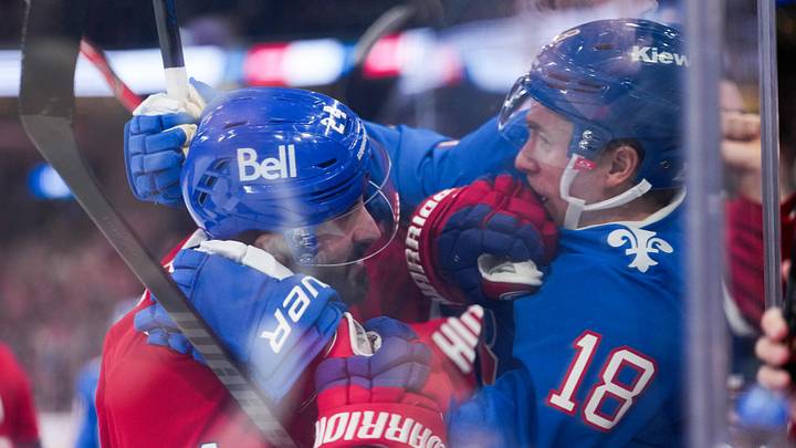 Jan 29, 2026; Montreal, Quebec, CAN; Montreal Canadiens forward Philip Danault (24) and Colorado Avalanche forward Jack Drury (18) fight during the second period at the Bell Centre. Mandatory Credit: Eric Bolte-Imagn Images
