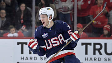 Feb 15, 2025; Montreal, Quebec, CAN; [Imagn Images direct customers only] Team United States forward Jake Guentzel (59) celebrates after scoring an empty net goal against Team Canada in the third period during a 4 Nations Face-Off ice hockey game at the Bell Centre. Mandatory Credit: Eric Bolte-Imagn Images