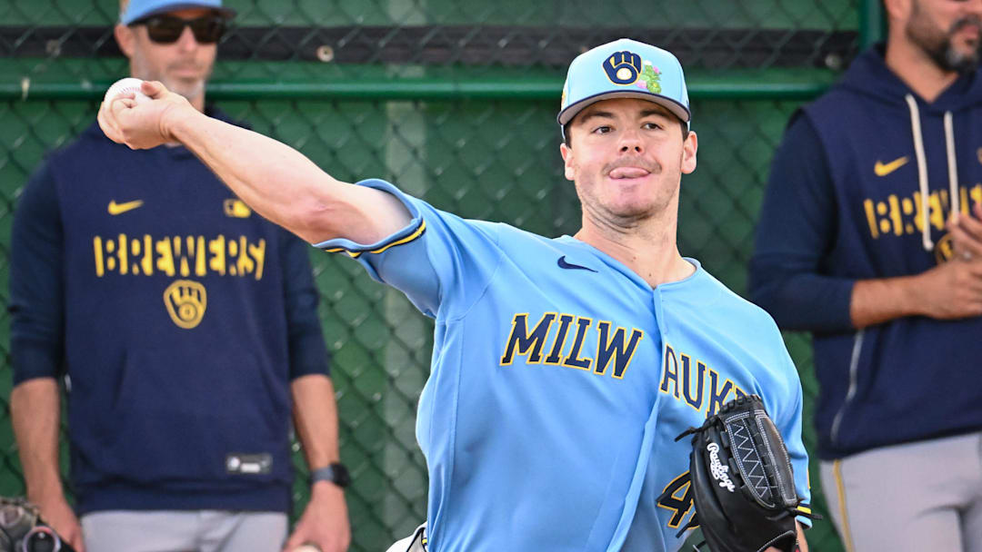 Milwaukee Brewers pitcher Logan Henderson (43) throws in the bullpen during spring training workouts. Milwaukee Brewers pitcher Logan Henderson (43) throws in the bullpen during spring training workouts.