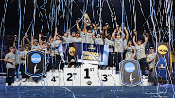 Apr 19, 2025; Ann Arbor, MI, USA;  The Michigan men’s gymnastics team celebrates their National Championship at Crisler Center. Mandatory Credit: Lon Horwedel-Imagn Images