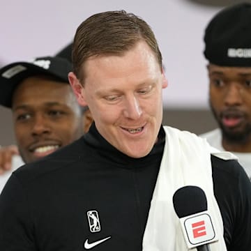 Dec 22, 2021; Las Vegas, NV, USA; Delaware Blue Coats head coach Coby Karl is interviewed after the Blue Coats defeated the Oklahoma City Blue 104-98 to win the G League Showcase Cup at Mandalay Bay Convention Center. Mandatory Credit: Stephen R. Sylvanie-Imagn Images