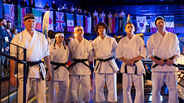 Cobra Kai. (L to R) William Zabka as Johnny Lawrence, Mary Mouser as Samantha LaRusso, Tanner Buchanan as Robby Keene, Xolo Maridueña as Miguel Diaz, Jacob Bertrand as Eli 'Hawk' Moskowitz, Gianni DeCenzo as Demetri in Cobra Kai. Cr. Curtis Bonds Baker/Netflix © 2024