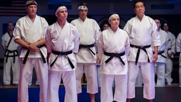Cobra Kai. (L to R) William Zabka as Johnny Lawrence, Tanner Buchanan as Robby Keene, Ralph Macchio as Daniel LaRusso, Mary Mouser as Samantha LaRusso, Yuji Okumoto as Chozen in Cobra Kai. Cr. Curtis Bonds Baker/Netflix © 2024