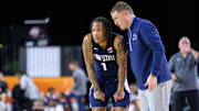 Penn State Nittany Lions guard Ace Baldwin Jr. (1) and head coach Mike Rhoades talk during the second half against the Virginia Tech Hokies at CFG Bank Arena.
