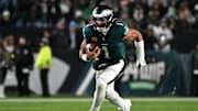 Nov 16, 2025; Philadelphia, Pennsylvania, USA; Philadelphia Eagles quarterback Jalen Hurts (1) rushes the ball against the Detroit Lions during the first half at Lincoln Financial Field. Mandatory Credit: Eric Hartline-Imagn Images