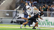 Honolulu, Hawaii, USA;  Utah State Aggies wide receiver Braden Pegan (11) can’t pull in a catch while being guarded by Hawaii Rainbow Warriors defensive back Kona Moore (2) during the first half at Clarence T.C. Ching Athletics Complex. Moore was called for pass interference during the play. 