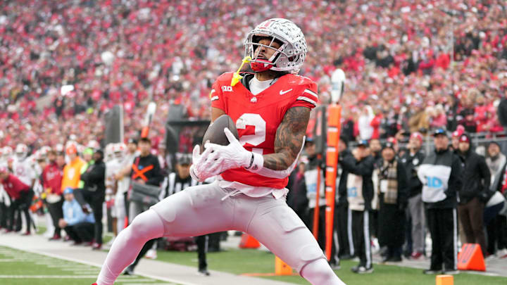 Ohio State Buckeyes wide receiver Emeka Egbuka (2) makes a touchdown catch against Indiana Hoosiers. Ohio State Buckeyes wide receiver Emeka Egbuka (2) makes a touchdown catch against Indiana Hoosiers.