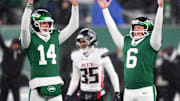 Atlanta Falcons CB Natrone Brooks looks on in the background as the New York Jets celebrated a game-winning kick on Sunday.