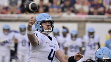 Jun 6, 2025; Montreal, Quebec, Canada; Toronto Argonauts quarterback  Nick Arbuckle (4) throws a pass during the first half against the Montreal Alouettes at Percival-Molson stadium. Mandatory Credit: Eric Bolte-Imagn Images