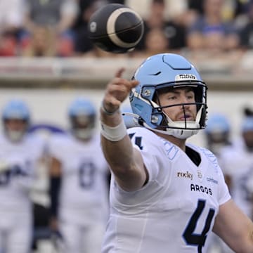Jun 6, 2025; Montreal, Quebec, Canada; Toronto Argonauts quarterback  Nick Arbuckle (4) throws a pass during the first half against the Montreal Alouettes at Percival-Molson stadium. Mandatory Credit: Eric Bolte-Imagn Images