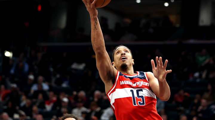 Feb 8, 2025; Washington, District of Columbia, USA; Washington Wizards guard Malcolm Brogdon (15) takes a shot during the second half against the Atlanta Hawks at Capital One Arena. Mandatory Credit: Daniel Kucin Jr.-Imagn Images