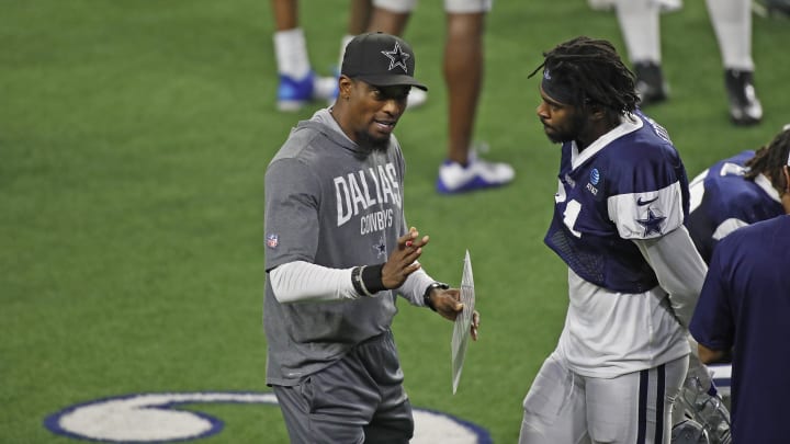 Frisco, TX, USA;  Dallas Cowboys player Trevon Diggs (right) talks with Al Harris (left) during training camp at Ford Center at The Star in Frisco, Texas. 