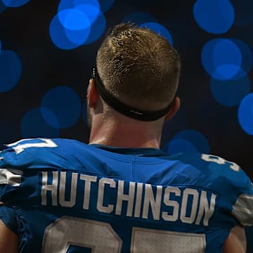 Sep 8, 2024; Detroit, Michigan, USA; Detroit Lions defensive end Aidan Hutchinson (97) is framed by the light show in the stands during a time out in the action against the Los Angeles Rams in the fourth quarter at Ford Field. Mandatory Credit: Lon Horwedel-Imagn Images