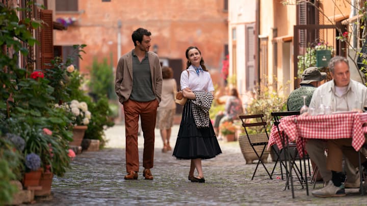 Emily in Paris. (L to R) Eugenio Franceschini as Marcello, Lily Collins as Emily in episode 410 of Emily in Paris