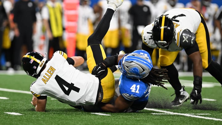 Pittsburgh Steelers quarterback Kyle Allen (4) is sacked by Detroit Lions linebacker James Houston (41).