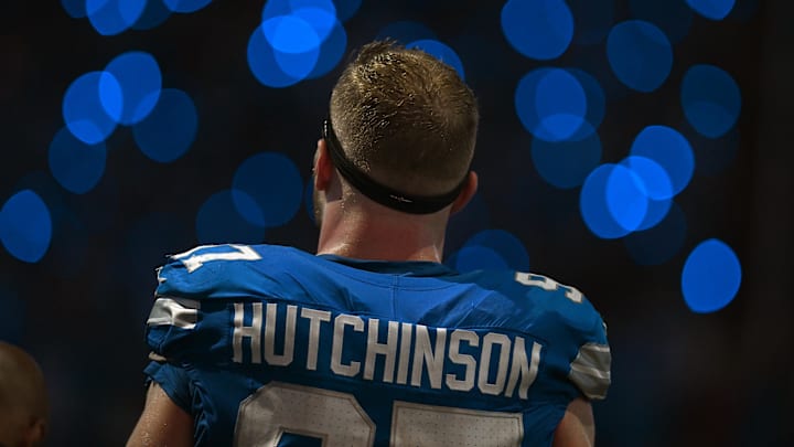 Sep 8, 2024; Detroit, Michigan, USA; Detroit Lions defensive end Aidan Hutchinson (97) is framed by the light show in the stands during a time out in the action against the Los Angeles Rams in the fourth quarter at Ford Field. Mandatory Credit: Lon Horwedel-Imagn Images