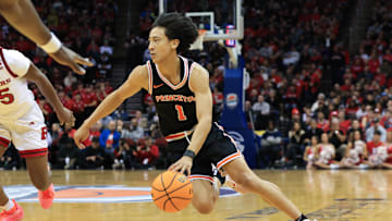 Dec 21, 2024; Newark, New Jersey, USA; Princeton Tigers guard Xaivian Lee (1) drives to the net against the Rutgers Scarlet Knights during the second half at Prudential Center. Mandatory Credit: Tom Horak-Imagn Images