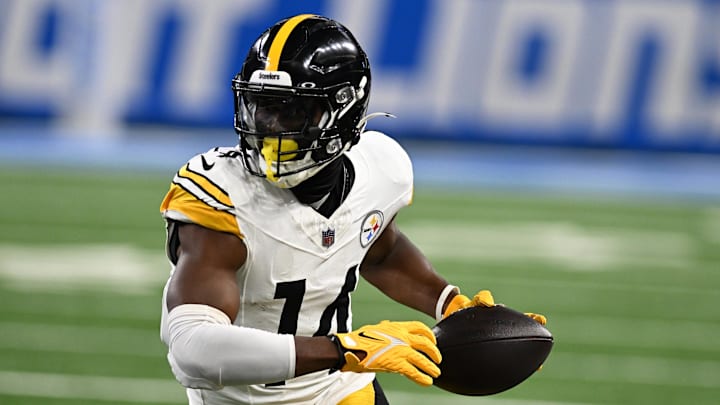 Aug 24, 2024; Detroit, Michigan, USA;  Pittsburgh Steelers wide receiver George Pickens (14) runs upfield after catching a pass against the Detroit Lions in the first quarter at Ford Field. Mandatory Credit: Lon Horwedel-Imagn Images